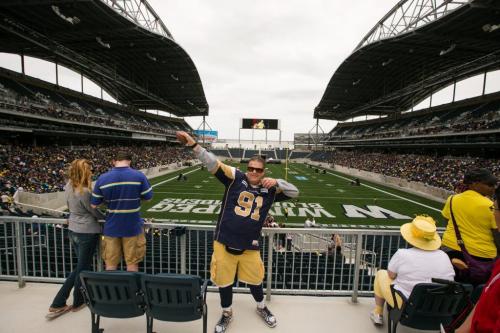 Dancing Gabe poses for the first time at Investors Group Field Saturday afternoon as thousands attend the One Heart celebration - the first event held at the new stadium.  130526 - Sunday, May 26, 2013 - (Melissa Tait / Winnipeg Free Press)