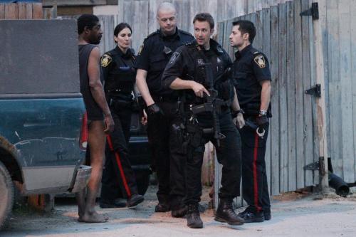 May 26, 2013 - 130526  - Police tactical unit attends a incident at 458 Sherbrook Sunday, May 26, 2013. John Woods / Winnipeg Free Press On May 26, 2013, at approximately 8:20 p.m., members of the Winnipeg Police Service responded to the area of the 500 block of Home Street regarding a suspicious incident. Officers were advised that a male and female were observed arguing while in the area, subsequently leaving in a green pick-up truck. Police were notified and the investigation is on-going. Investigators are making every effort to determine if the female accompanied the male voluntarily.