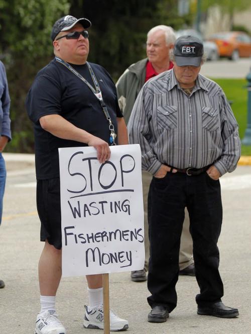 A group of fishermen protest in front of the Leg. They are complaining that they are not allowed to market their scub fish. May 27, 2013  BORIS MINKEVICH / WINNIPEG FREE PRESS