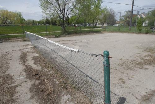 This run down tennis court will be rebuilt to  new basketball and skateboard park on the Eldon Ross pool land on Pacific Ave W- Standup Photo- May 27, 2013  (JOE BRYKSA / WINNIPEG FREE PRESS)