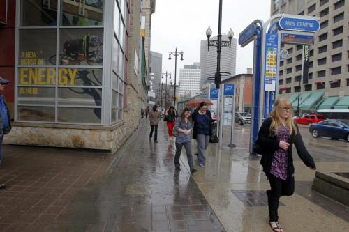 For Melissa Martin column. General shot of people in winnipeg. On streets. Looking from inside too. May 28, 2013  BORIS MINKEVICH / WINNIPEG FREE PRESS