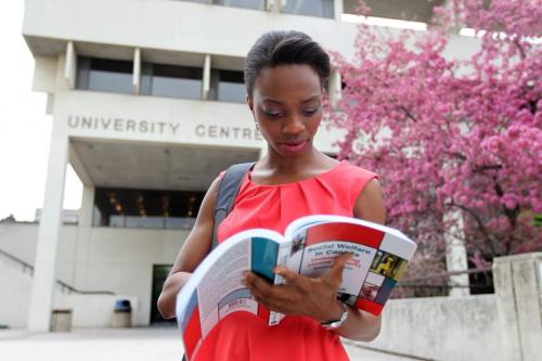 University of Manitoba campus life. Emem Ukpong in the faculty of Social Work, reads outside University Centre Wednesday afternoon.   May 29, 2013 Ruth Bonneville Winnipeg Free Press