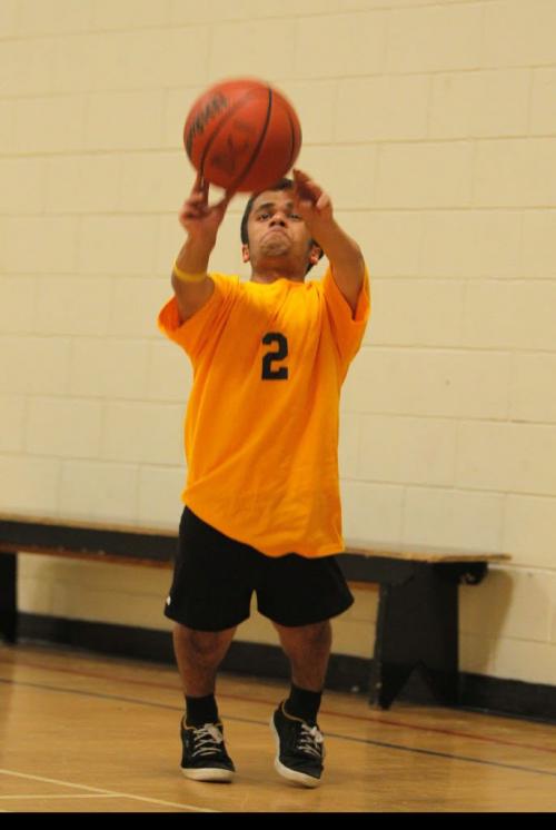 Vivek Bhagria shoots hoops in the Dakota Collegiate gym. He is an 18-year-old grade 12 student who lives with dwarfism and will represent Manitoba and Canada at the 2013 World Dwarf Games on Aug. 3-10, 2013 at Michigan State University, East Lansing Michigan. He will compete in soccer, track, basketball, volleyball, boccia and badminton. He was the Dakota Collegiate athlete of the month for April as he led the school's Ultimate team in assists and points. For Ashley's story in Sat. paper. His coach Brad Johnston will be there. May 31, 2013  BORIS MINKEVICH / WINNIPEG FREE PRESS