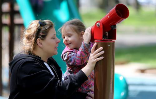 Carla Baranski and her daughter, Kira, playing with a telescope in Kildonan Park, Saturday, June 1, 2013. (TREVOR HAGAN/WINNIPEG FREE PRESS)