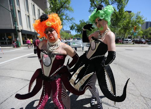Gloria Booths and Pictoria Secrete leading the 26th Annual Pride Parade as it made its way through downtown Winnipeg, Sunday, June 2, 2013. (TREVOR HAGAN/WINNIPEG FREE PRESS)