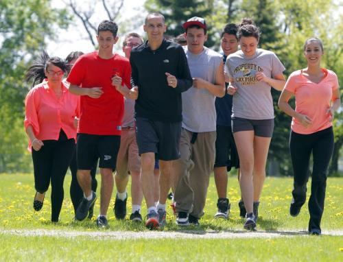 MLA Kevin Chief is training with some youth that will be running the Manitoba Marathon. Photo taken in St. John's Park. May 31, 2013  BORIS MINKEVICH / WINNIPEG FREE PRESS