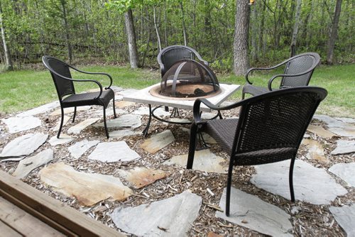 (Back yard patio) This Grand Pointe home, located at 246 Dymar Way just outside city limits, went on the market this morning. Tuesday, June 4, 2013. (TODD LEWYS) (JESSICA BURTNICK/WINNIPEG FREE PRESS)