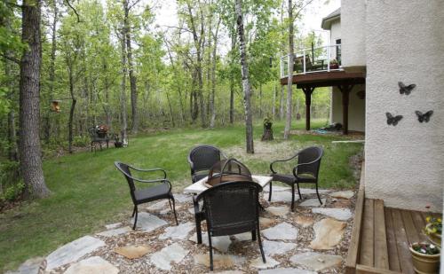 (Back yard) This Grand Pointe home, located at 246 Dymar Way just outside city limits, went on the market this morning. Tuesday, June 4, 2013. (TODD LEWYS) (JESSICA BURTNICK/WINNIPEG FREE PRESS)