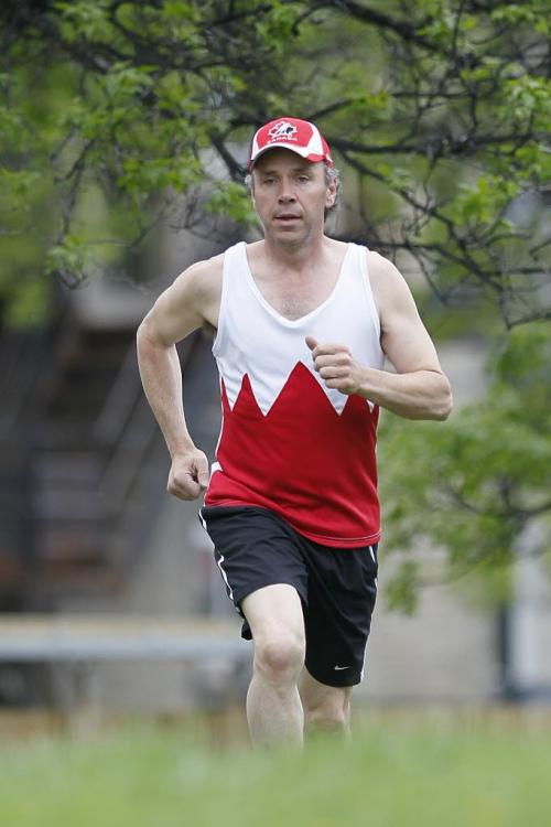June 4, 2013 - 130604  -  Doug deJong, 51, is a marathon runner who was at the Boston Marathon, about 200 metres away when the bombs exploded. He had a red and white Canada running singlet custom-made for the Boston Marathon. Doug is a construction worker who is working on-site at a new apartment complex on William. John Woods / Winnipeg Free Press
