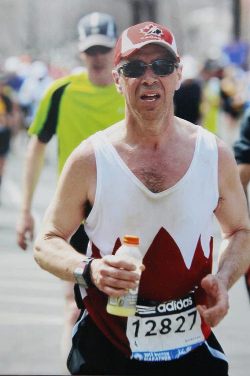 June 4, 2013 - 130604  -  Doug deJong, 51, is a marathon runner who was at the Boston Marathon, about 200 metres away when the bombs exploded. He had a red and white Canada running singlet custom-made for the Boston Marathon. Doug is a construction worker who is working on-site at a new apartment complex on William. Courtesy of Doug deJong/ Winnipeg Free Press