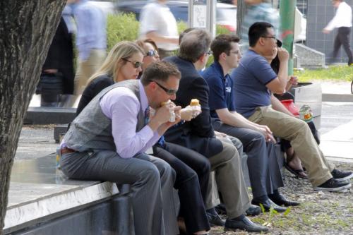 Some lunch time eaters enjoy some sandwiches on Broadway. BORIS MINKEVICH / WINNIPEG FREE PRESS June 5, 2013