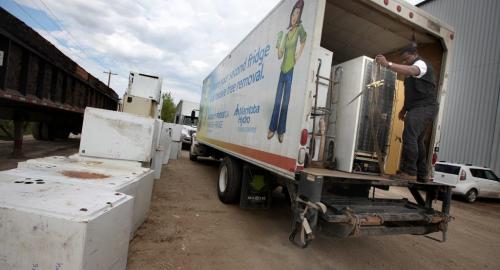 Workers prepare to unload a truckload of re-cycled refirgerators at Jaco EcoSolutions at 560 Messier Street. See Elizabeth Fraser story... June 5, 2013 - (Phil Hossack / Winnipeg Free Press)