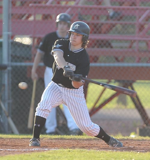 Brandon Sun James Shearer connected with a pitch for the Brandon Marlins during their MSBL game against the Oak River Dodgers at Andrews Field on Wednesday. (Bruce Bumstead/Brandon Sun)