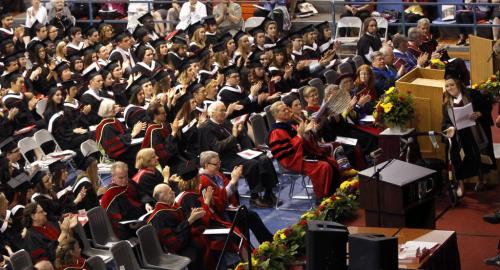 At right, Megan Fultz finishes her Valedictory Adress at ninety-ninth Convocation ceremony for the conferring of degrees in Arts and Kinesiology in the University of Winnipeg Duckworth Centre Thursday. Nick Martin story(WAYNE GLOWACKI/WINNIPEG FREE PRESS) Winnipeg Free Press June 6 2013