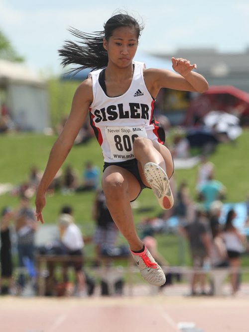Sisler High's Geselle Dela Merced competes in the Jr Varsity girls long jump at the 2013 MILK Provincial High School Track & Field Championships - June 06, 2013   (JOE BRYKSA / WINNIPEG FREE PRESS)