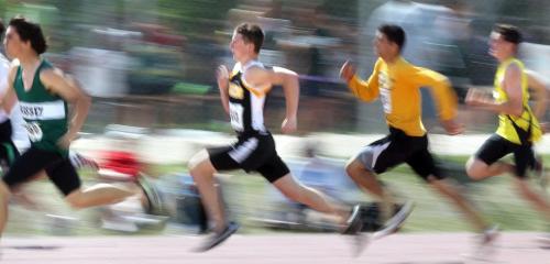 Senior Men's 200 meter runners burst around the opening turn and sprint to the finish Friday afternoon at the Provincial Track and Field meet at the U of M. See story. June 7, 2013 - (Phil Hossack / Winnipeg Free Press)