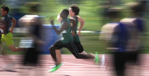 Senior Men's 200 meter runners burst around the opening turn and sprint to the finish Friday afternoon at the Provincial Track and Field meet at the U of M. See story. June 7, 2013 - (Phil Hossack / Winnipeg Free Press)