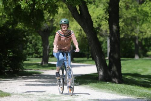 Joan Thomas, a novelist, in her favourite place in the city, the bikes paths through Point Douglas near the Norquay Community Centre, Thursday, June 6, 2013. (TREVOR HAGAN/WINNIPEG FREE PRESS) - Our Winnipeg