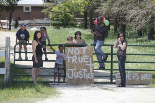 June 8, 2013 - 130608  - Friends and supporters of Arrayl Mason (5th from left), owner of Aesgard Ranch, face off with protestors at her horse ranch Saturday June 8, 2013. A group gathered in front of Aesgard Ranch on highway 8 Saturday, June 8, 2013 in response to alleged animal abuse. John Woods / Winnipeg Free Press