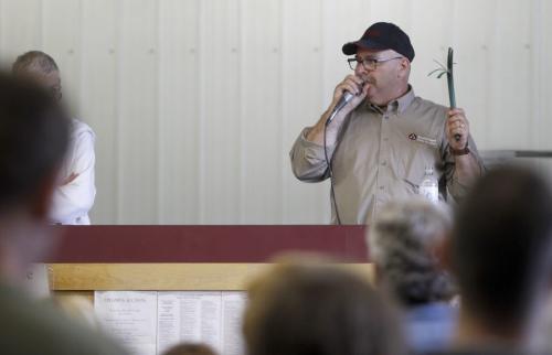 Auctioneer, Jim Todd sells items during the Winnipeg Police Service Unclaimed Goods Auction at Associated Auto Auction, Sunday, June 9, 2013. (TREVOR HAGAN/WINNIPEG FREE PRESS) - see adam wazny story