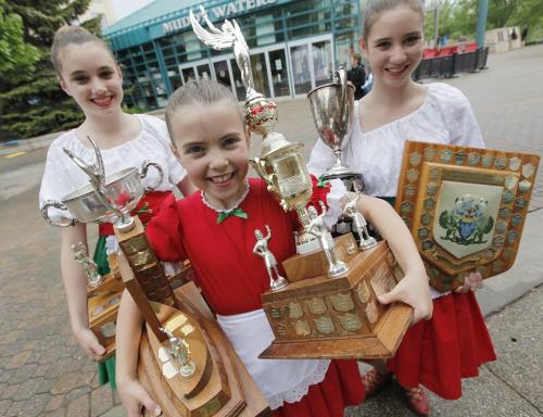 June 9, 2013 - 130609  - (L to R) Allison Unruh (13) and her sisters Laura (9) and Rachel (15) show off their overall aggregate awards at the Mid Canada open Highland Dance Championship and Competition at the Forks Sunday, June 9, 2013. John Woods / Winnipeg Free Press