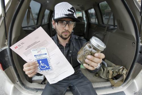 June 9, 2013 - 130609  - Thaddeus Conrad of Steinbach shows his medical marijuana permit and claims he was beaten by police and arrested for possession of marijuana for trafficking. Conrad was photographed in Steinbach Sunday, June 9, 2013. John Woods / Winnipeg Free Press