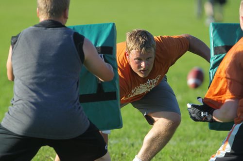 Brandon Sun Brendynn Tuttosi rushes off the line during an evening practice with the Westman Wolverines at Crocus Plains on Monday. (Bruce Bumstead/Brandon Sun)