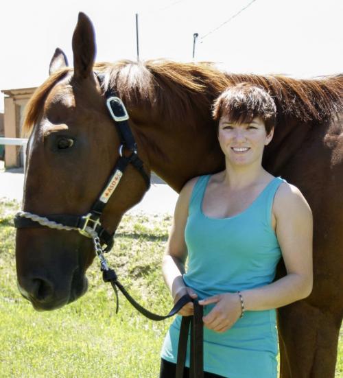 Jennifer Reid, who finished second by one win in the jockey standings last year, won six races over the weekend and seven over the last three days of racing at the Assiniboia Downs. Pictured here with six year old horse Seven Tough on Tuesday, June 11, 2013, she is currently tied for first place in the jockey standings with Paul Nolan at 19 wins each. (JESSICA BURTNICK/WINNIPEG FREE PRESS)