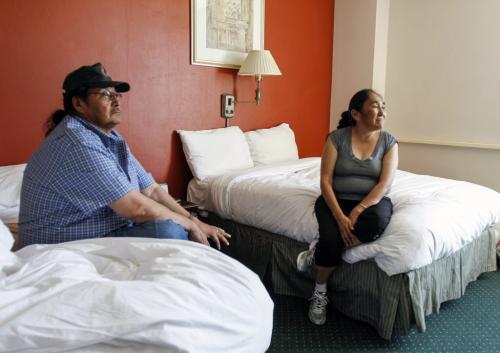 Laura and Donald Tssessaze, pictured on Tuesday, June 11, 2013 in their Marlborough Hotel room,  travelled from their home in Lac Brochet, Man. (about 1,000 kilometres north of Winnipeg) to shed some light on gaps in aboriginal health care after the death of their daughter, Lisa Tssessaze. the Northlandes Denesuline First Nation and Manitoba Keewatinowi Okimakanak Inc. (MKO), a group of northern Manitoba chiefs, are calling for an inquest. MKO issued a release Tuesday, saying the group blamed TssessazeÄôs doctor in Winnipeg and the Northern Regional Health Authority for her death. (ALEXANDRA PAUL) (JESSICA BURTNICK/WINNIPEG FREE PRESS)