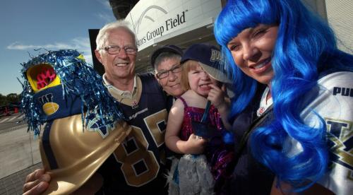 Bomber Fans, left to right Irv Koch his wife Sandi, grand-daughter Iyla and daughter Keely. See Rany Turner Tale....June 11, 2013 - (Phil Hossack / Winnipeg Free Press)