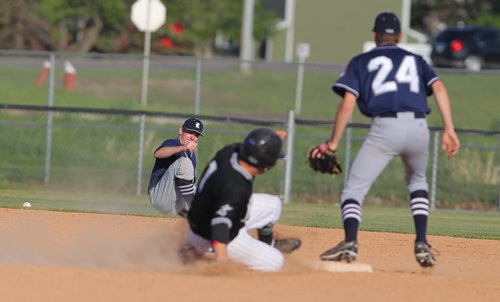 Brandon Sun Reston Rockets' Andy Moore had some trouble handling the ball for the force-play at second-base during Tuesday's MSBL against the Brandon Marlins at Andrews Field. (Bruce Bumstead/Brandon Sun)