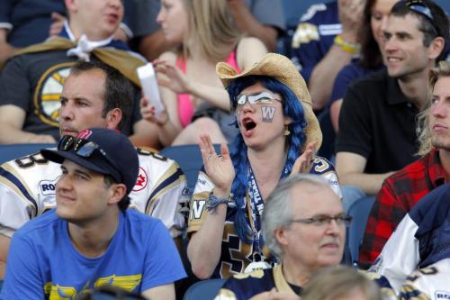 Winnipeg Blue Bombers play their first game in the Investors Group Stadium. Fans go crazy. BORIS MINKEVICH / WINNIPEG FREE PRESS June 12, 2013.