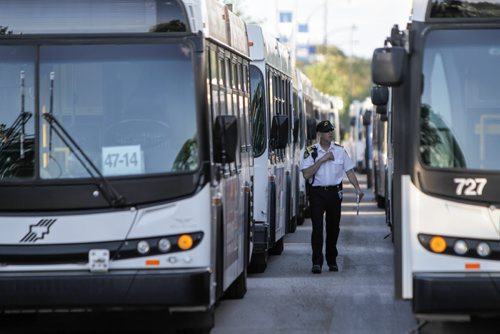 Current estimates by transit organizers suggest that about 75-80 buses are awaiting Bomber fans outside the stadium to shuttle them to an array of post game parties. The inaugural Winnipeg Blue Bombers game at the new Investors Field Stadium was played against the Toronto Argonauts on Wednesday, June 12, 2013. (JESSICA BURTNICK/WINNIPEG FREE PRESS)