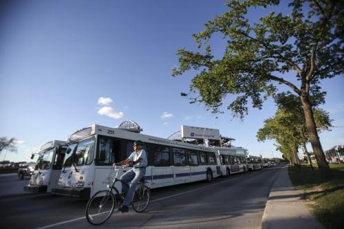 Current estimates by transit organizers suggest that about 75-80 buses are awaiting Bomber fans outside the stadium to shuttle them to an array of post game parties. The inaugural Winnipeg Blue Bombers game at the new Investors Field Stadium was played against the Toronto Argonauts on Wednesday, June 12, 2013. (JESSICA BURTNICK/WINNIPEG FREE PRESS)