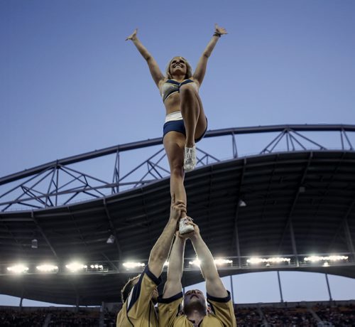 The Blue Lightning cheerleading squad continued to perform for fans as dusk fell over the new Investors Group Field Stadium. The inaugural Winnipeg Blue Bombers game at the new Investors Field Stadium was played against the Toronto Argonauts on Wednesday, June 12, 2013. (JESSICA BURTNICK/WINNIPEG FREE PRESS)