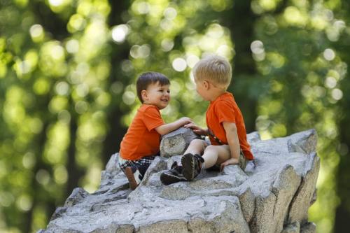 Friendship on the rocks - but not in the usual sense of the term. Tieg Meacham (left, age 2) and Alex Ploegman (age 3) meet atop a gigantic boulder in Kildonan Park for an unplanned playdate on Thursday, June 13, 2013. (JESSICA BURTNICK/WINNIPEG FREE PRESS)