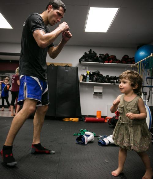Roland Delorme - or Rolly as he's better known - shadow boxes along with his 2 1/2 year old daughter Taliya after a sparring session at Winnipeg Elite Boxing and MMA Academy. Delorme will be the only Manitoban competing at UFC 161 on June 15 at MTS Centre.  130607 - Friday, June 07, 2013 - (Melissa Tait / Winnipeg Free Press)