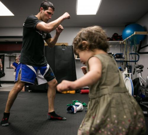Roland Delorme - or Rolly as he's better known - shadow boxes along with his 2 1/2 year old daughter Taliya after a sparring session at Winnipeg Elite Boxing and MMA Academy. Delorme will be the only Manitoban competing at UFC 161 on June 15 at MTS Centre.  130607 - Friday, June 07, 2013 - (Melissa Tait / Winnipeg Free Press)