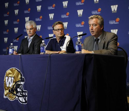 (left to right) Winnipeg Blue Bombers Vice President and COO Jim Bell, President and CEO Garth Buchko, and Winnipeg Transit Director Dave Wardrop spoke to media at a press conference at the Investors Group Field stadium on Thursday, June 13, 2013, the day following the Bombers inaugural preseason game against the Toronto Argos, in which they lost 24-6. (JESSICA BURTNICK/WINNIPEG FREE PRESS)