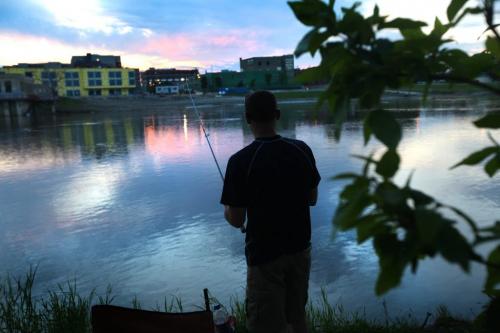 David Sylvestre  enjoys an evening fishing on the Red River near Whittier Park Thursday. Standup photo. Photography by Ruth Bonneville Winnipeg Free Press June 13,, 2013