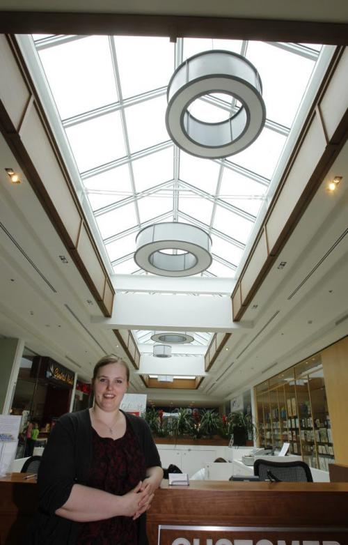 Finance/Business     Carleen McDowell, an administrative assistant with 20 Vic Management Inc., the firm which manages the St. Vital Centre and won a BOMA Best Award of Excellence for energy efficiency improvement at the mall. She is by the new sky lights and LED lighting. Murray McNeill story(WAYNE GLOWACKI/WINNIPEG FREE PRESS) Winnipeg Free Press June 14 2013