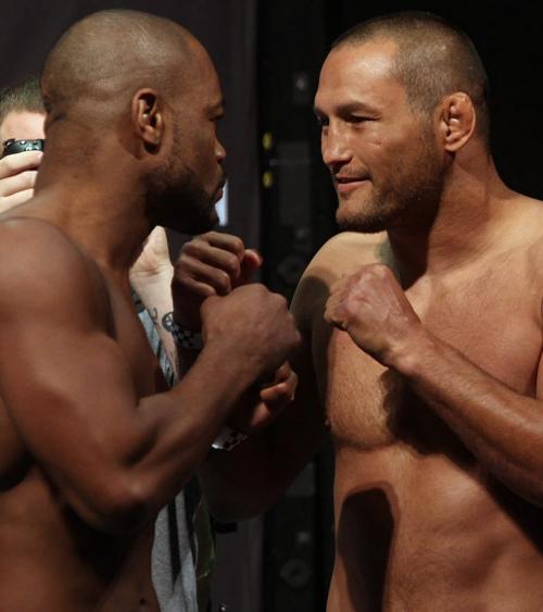 Rashad Evans, left, and Dan Henderson square off at the UFC 161 weigh in Friday afternoon at the MTS Centre in Winnipeg- Rashad Evans and  Dan Henderson, will fight in the light heavyweight bout  that will take place Saturday night  -See story- June 13, 2013   (JOE BRYKSA / WINNIPEG FREE PRESS)