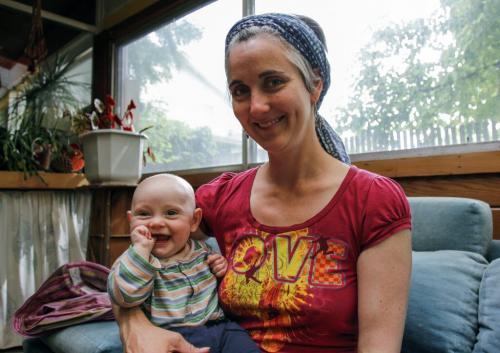 Nikki Ibbitt, an internationally educated midwife (IEM) enjoys a moment with six-month-old son Santino on Friday, June 14, 2013. Despite completing her education in Texas in 2011, she received her training in a birth centre and must therefore find a clinical placement in a hospital before she can be registered to practice in Canada. (LARRY KUSCH) (JESSICA BURTNICK/WINNIPEG FREE PRESS)