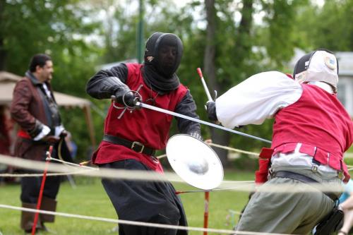 SWORDS AND SABRES PIRATE RENAISSANCE  event  which took place at Coronation Park .   Pirate enthusiast's dressed up in RENAISSANCE fencing costumes and displayed various fencing techniques at the Swords and Sabres event Saturday. See Alex Paul Story.  Photography by Ruth Bonneville Winnipeg Free Press June 15,, 2013