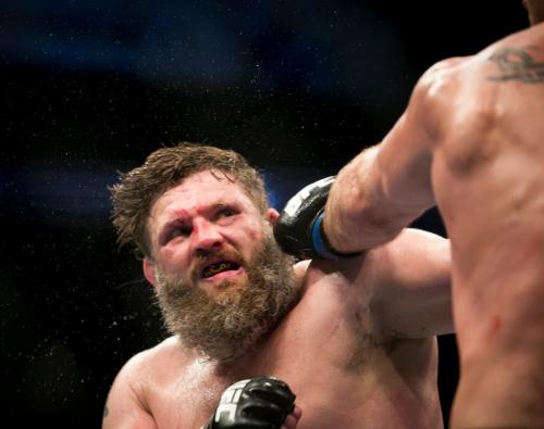 Roy Nelson takes a shot from Stipe Miocic during their  Heavyweight fight at UFC 161. Miocic won in a unanimous decision. 130616 - Sunday, June 16, 2013 - (Melissa Tait / Winnipeg Free Press)