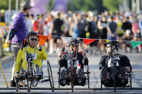 Wheelchair participants on the start line with full marathon runners in the background at the University of Manitoba prior to the 35th Annual Manitoba Marathon, Sunday, June 16, 2013. (TREVOR HAGAN/WINNIPEG FREE PRESS)