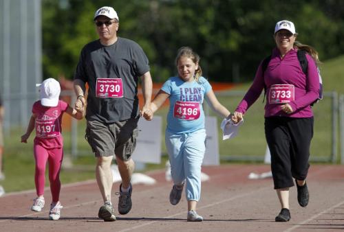 10K participants near the finish line at the University of Manitoba during the 35th Annual Manitoba Marathon, Sunday, June 16, 2013. (TREVOR HAGAN/WINNIPEG FREE PRESS)