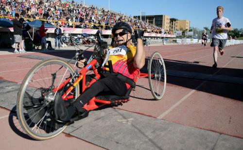 Dale Schiissler, wheelchair marathon winner, crossing the finish line at the University of Manitoba during the 35th Annual Manitoba Marathon, Sunday, June 16, 2013. (TREVOR HAGAN/WINNIPEG FREE PRESS)