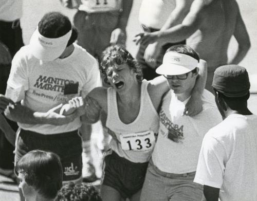 First annual Manitoba Marathon - June 16,  1979 Winnipeg Free Press  An exhausted runner is helped to the sidelines.   (Wayne Glowacki/Winnipeg Free Press )