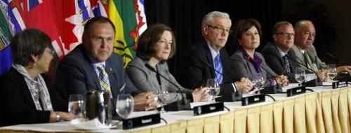 LtoR  Nunavut  Premier Eva  Aariak ,Yukon Premier Darrell Pasloski ,  Alberta Premier Alison Redford ,Manitoba Premier Greg Selinger ,BC Premier Christy Clark , Sask.  Premier Brad Wall , NWT Premier Bob McLeod at joint closing statement  speaks at the  2013 Western  Premiers Conference  noon hour closing press conference  Monday at the Fairmont Hotel  , they will discussed oil ,  the economy , and other issues  such as bullying . Story by  Larry Kusch  KEN GIGLIOTTI / JUNE 7 2013 / WINNIPEG FREE PRESS